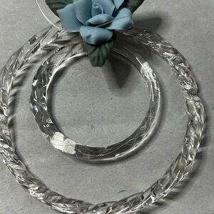 Elegant Clear Glass Clear Hoop Ornament  with a Blue Flower